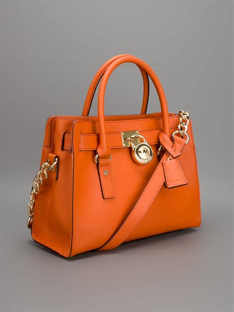 michael kors orange tote.